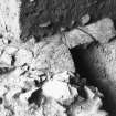 Excavation photograph: area X/H - details of flagstones in section.