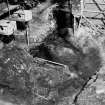 Excavation photograph: area H/X - walls of Storekeepers House, new wall running N-S and relation to bedrock.