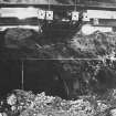 Excavation photograph: area H/X - E-W showing midden from bedrock to cartshed floor.