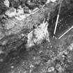 Excavation photograph : area BB - service trench in backwell yard with old toilet block walls.