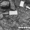 Excavation photograph : area X/H - detail of close set cobbles taken from north.