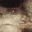 Excavation photograph : detail of wall 1066 and N-S wall of storekeepers house with plaster.