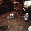 Excavation photograph : area X - excavation after removal of flagstones and cobbles.