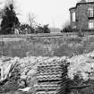 Dunfermline, Priory Lane, former Lauder Technical College, excavations.
Excavation photograph: wall F174 immediately west of frame 9/14.