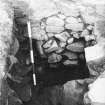 Excavation photograph - lower courses of barmkin wall in Room I