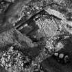 Excavation photograph : trench A - walls, floor of barmkin and small area of flagstones.
