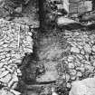 Excavation photograph : trench 2 showing boulders and clay, from N.