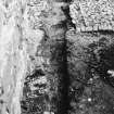 Excavation photograph : trench 2 showing boulders and clay, from S.