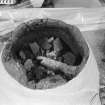 A Ratho urn under laboratory excavation.