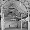 Tayburn Works, Dundee. General view showing ornate cast-iron roof trusses in roof of high section of works.
