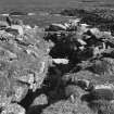 Dun Mor, Vaul, Tiree, broch.
Photograph showing the mural gallery with one lintel in situ, prior to excavation.