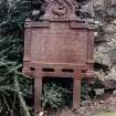 Detail of cast iron headstone.