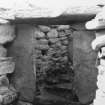 Excavation photograph: Gate in passage A.