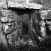 View of window on N wall of southern chapel from interior.