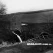 Copy of historic photograph showing view of mill and bridge from NW.