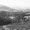 Copy of historic photograph showing distant view from E.
