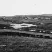 Copy of historic photograph showing distant general view from SE.