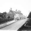 Copy of historic photograph showing view from NE.