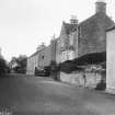 Copy of historic photograph showing view from SW.