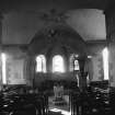 Interior.
Preaching auditorium, view from N aisle towards apse after 1924 restoration.