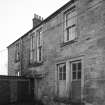 View of rear of main house from NW