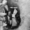 Excavation photograph - West stone hole (showing packing) from N.N.W.