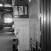 Interior view of Cairndhu Hotel, Helensburgh, showing side of hall fireplace.