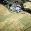 An oblique aerial view of Morayston, Petty, Inverness, looking NNE.