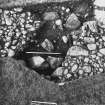 Excavation photograph : trench II - trench into cairn from above.