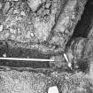 Excavation photograph - Tilting slabs in angle of cable track within Trench I - from N