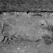 Excavation photograph : overlap to B/59233, west end of section, shows slumped eroded lobe, from south-east.