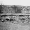 Excavation photograph : stone feature 102 and 103 relationship with quarry.