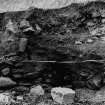 Excavation photograph : stone feature 104.