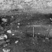 Excavation photograph : ditch fills 36, 37, 35, 39 and wall 55.