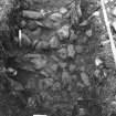 Excavation photograph : f013 - large lower make up stones of apron.