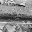Excavation photograph : running section across apron.