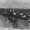 Excavation photograph : area 5 - f4046, 4047, 4009, box section from east.