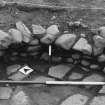 Excavation photograph : area 5 - f4030, 4037, west wall of oven from west.