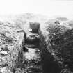 Excavation photograph.  Rampart with drain cutting through.
Copied from A O Curle photograph album MS/28/461.
Duplicate of ST/1891.