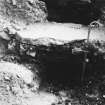 Excavation photograph. Incompleted drain issuing from deep bath.
Copied from A O Curle photograph album MS/28/461.
