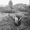 Excavation photograph. Possibly hearth-edging in barracks.
Film negative 5.5" x 3.5".
Duplicate print (C30002) copied from A O Curle photograph album (MS/28/461) is
titled 'Furnace flue looking West'.