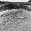 Excavation photographs: SW quadrant of hut circle 10/1; cairn 10/3.