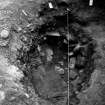 Excavation photograph : SW quadrant showing position of 023 (cremation deposit) in 018 (soil below cist slab).