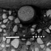Excavation photograph : find 38, in 049 resting on 037.