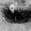 Excavation photograph : 058 in NW quadrant, half sectioned.