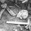 Excavation photographs: Site under excavation, including sections and close ups of finds in-situ.