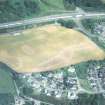 Aerial view of North Kessock oval enclosure and ring ditch cropmarks, Black Isle, looking NE.