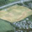 Aerial view of North Kessock oval enclosure and ring ditch cropmarks, Black Isle, looking NE.