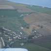 Aerial view of Portmahomack village and excavation, Tarbet Ness, Easter Ross, looking E.