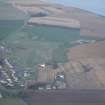 Aerial view of Portmahomack village and excavation, Tarbet Ness, Easter Ross, looking NE.